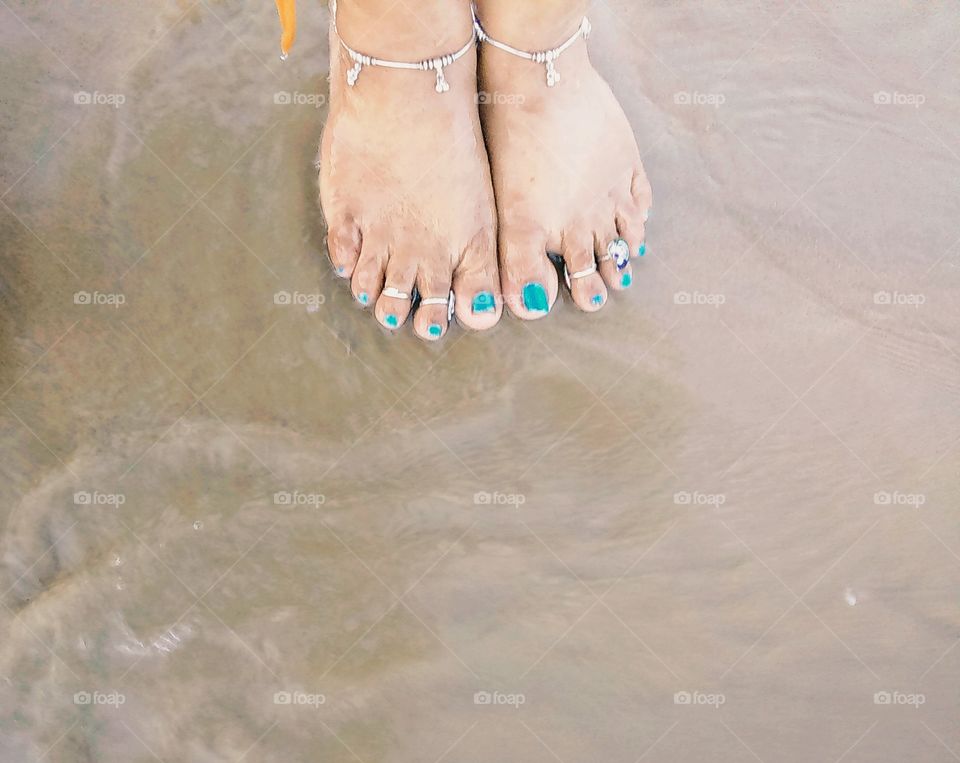 the joy of walking bare feet on the wet sand and let the waves touch you and go