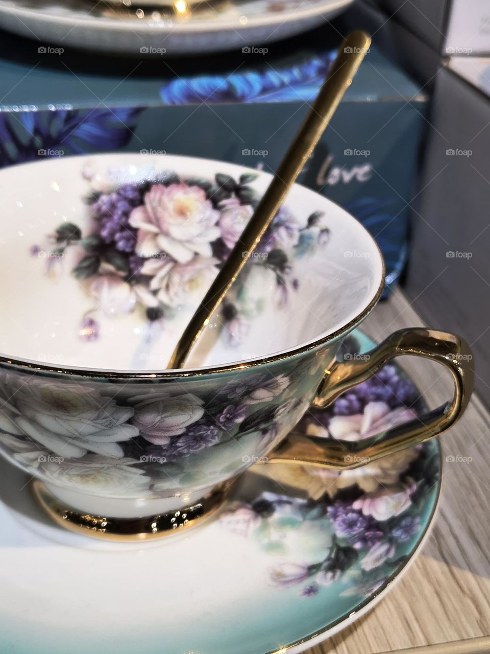 A cup with old stories, on a plate from another time.