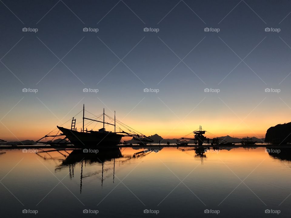 Silhouette of a boat at Sunset