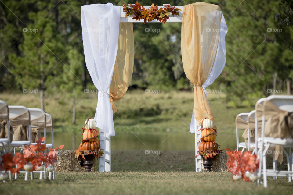 Fall wedding prop setup pumpkins