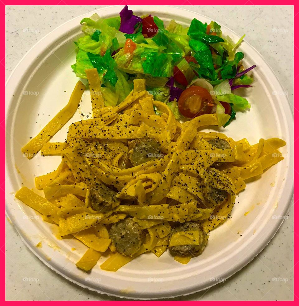 A delightful supper at church. It appears to be vividly colorful and delicious, making it appealing.