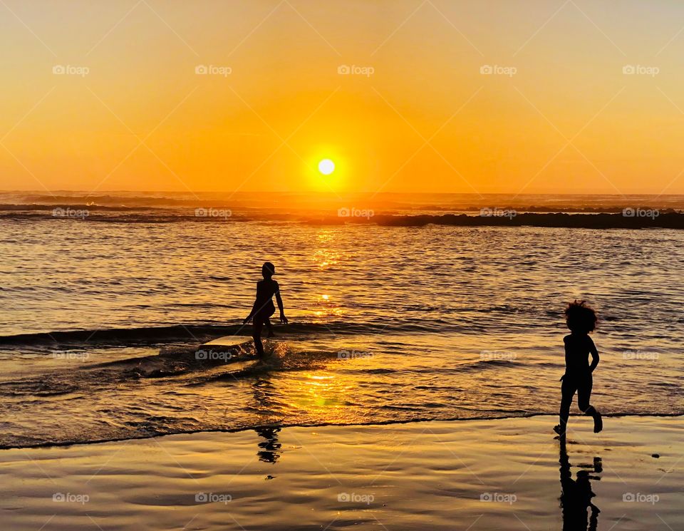 Kid play in the beach