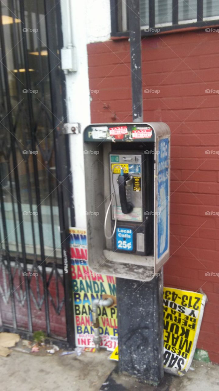 payphone. city phone.  misused. not sure how to use. hangup. wasn't paying attention.  how do you hang up?    end call