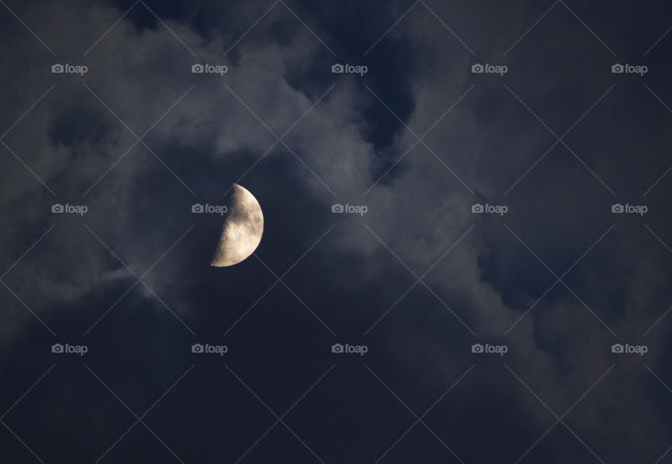 Moon at cloudy summer night