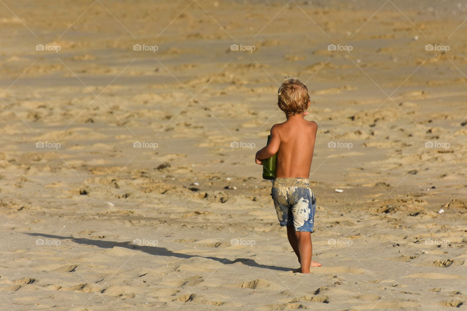 Blonde Beach Boy With Empty Beer Bottle, Mossel bay, South Africa