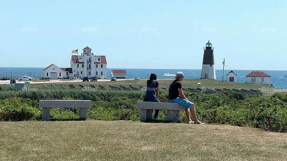 Sitting on s bench, lighthouse