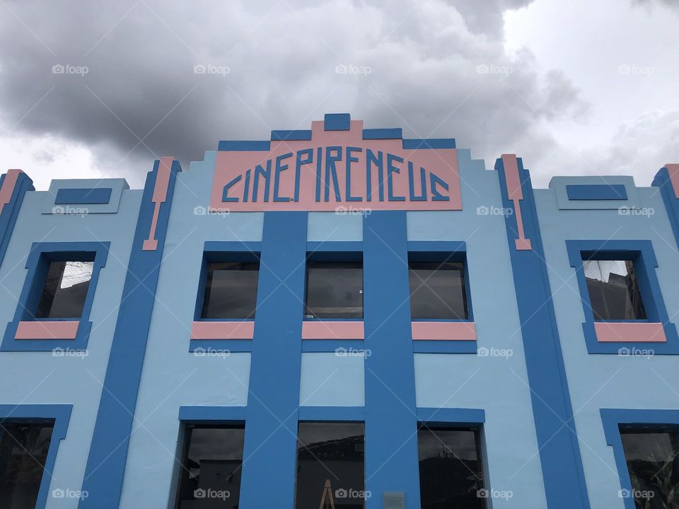 Building facade painted in blue and pink