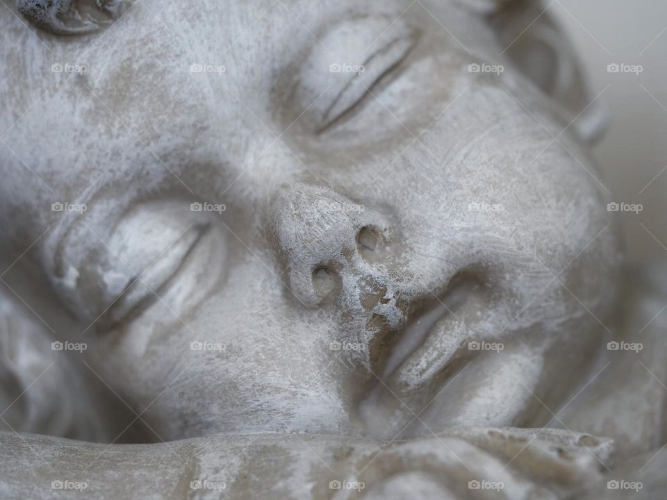 Face of angel sculpture