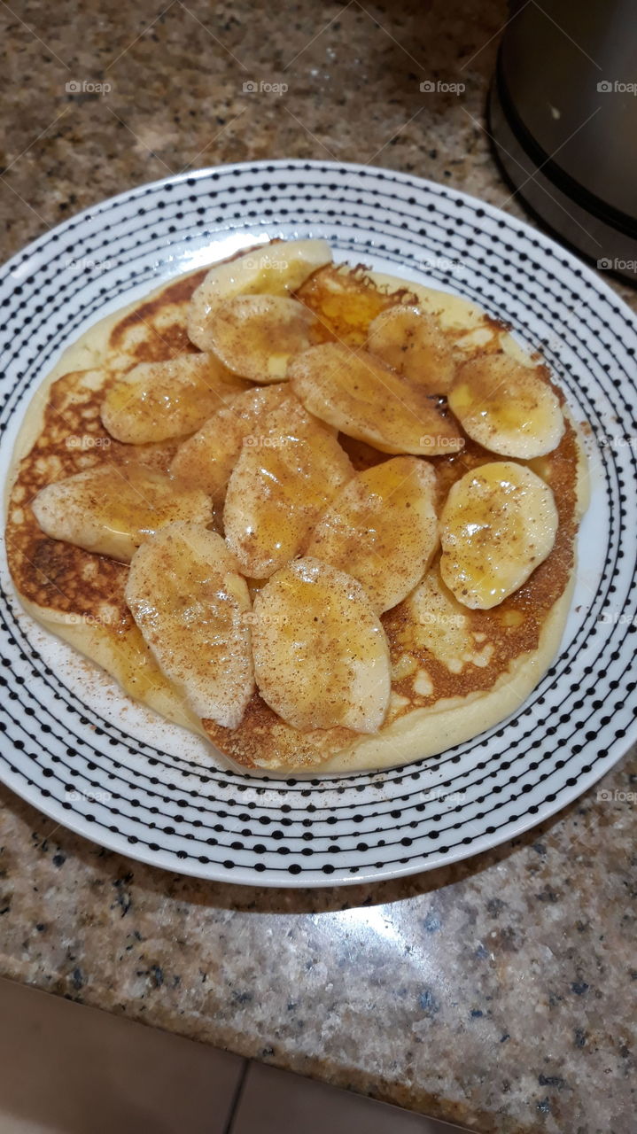 delicious banana and syrup breakfast pancake