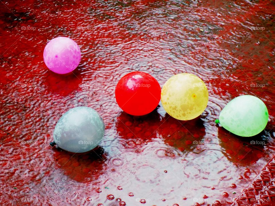 Colourful balloon in rain