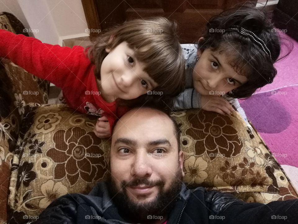 A father and two girls