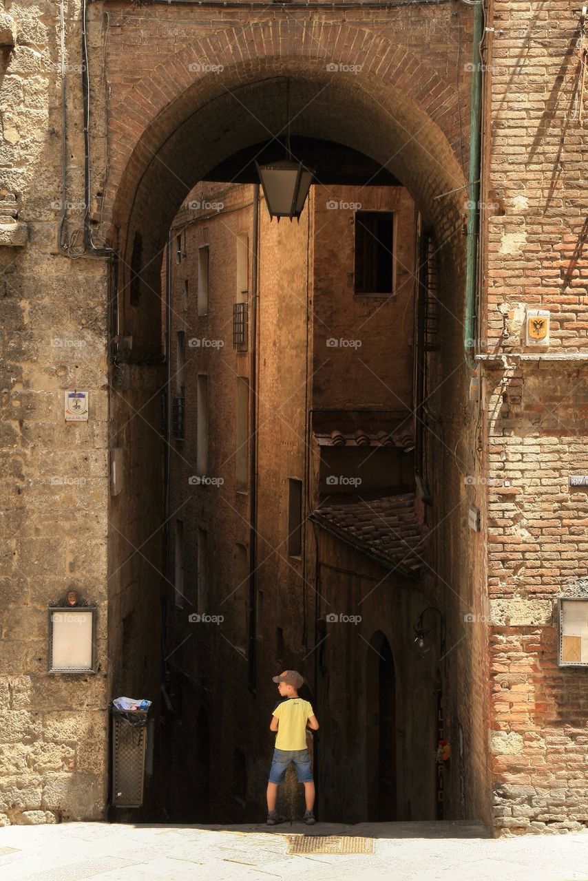 Boy in an archway