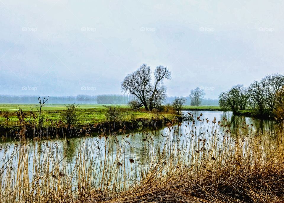 Scenic Leie river meandering through Flanders