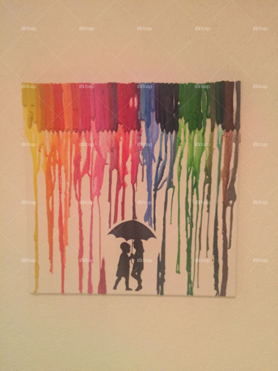 Couple in the rainbow rain