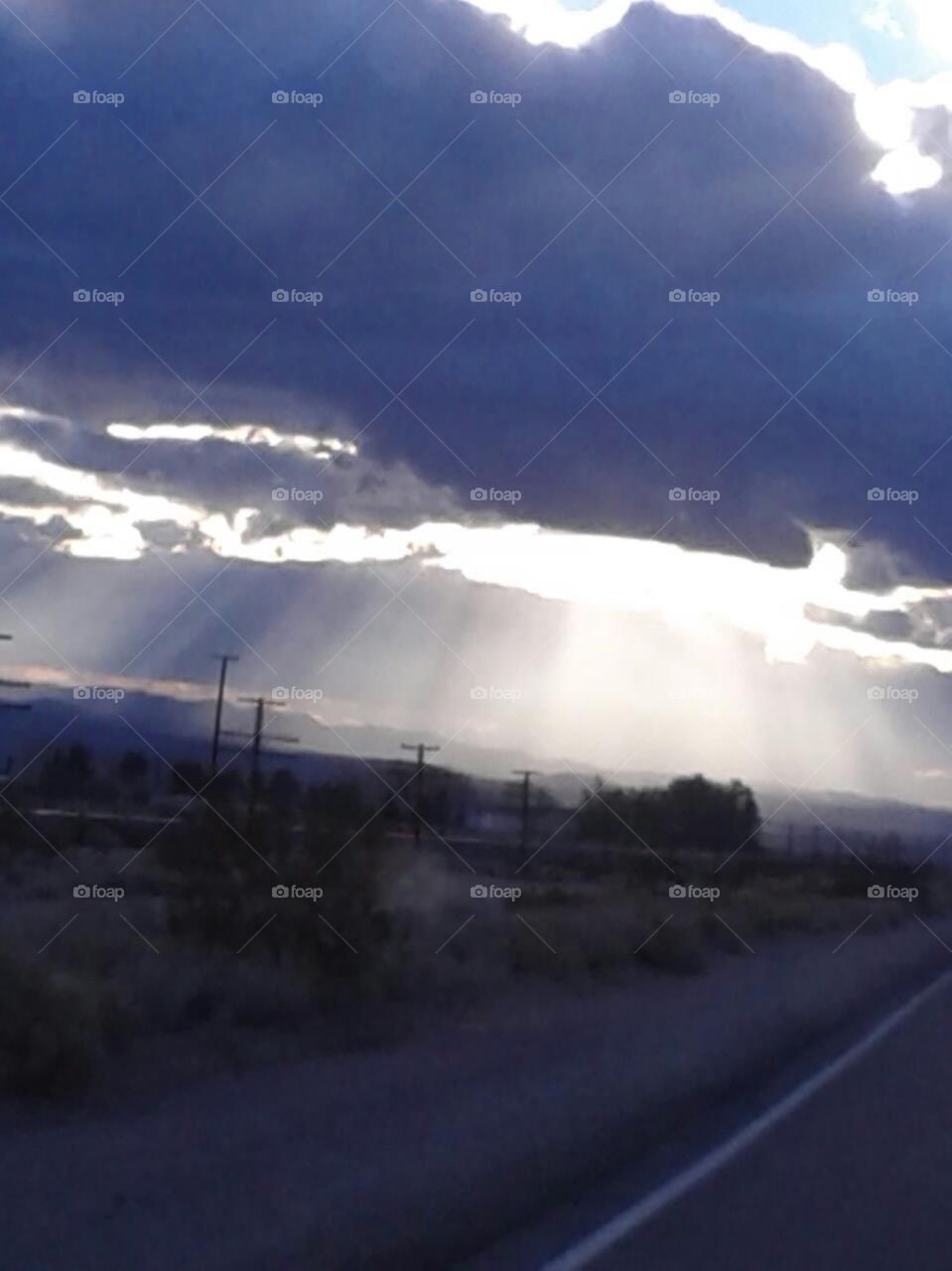 sunshine. the rays going through the clouds is just beautiful