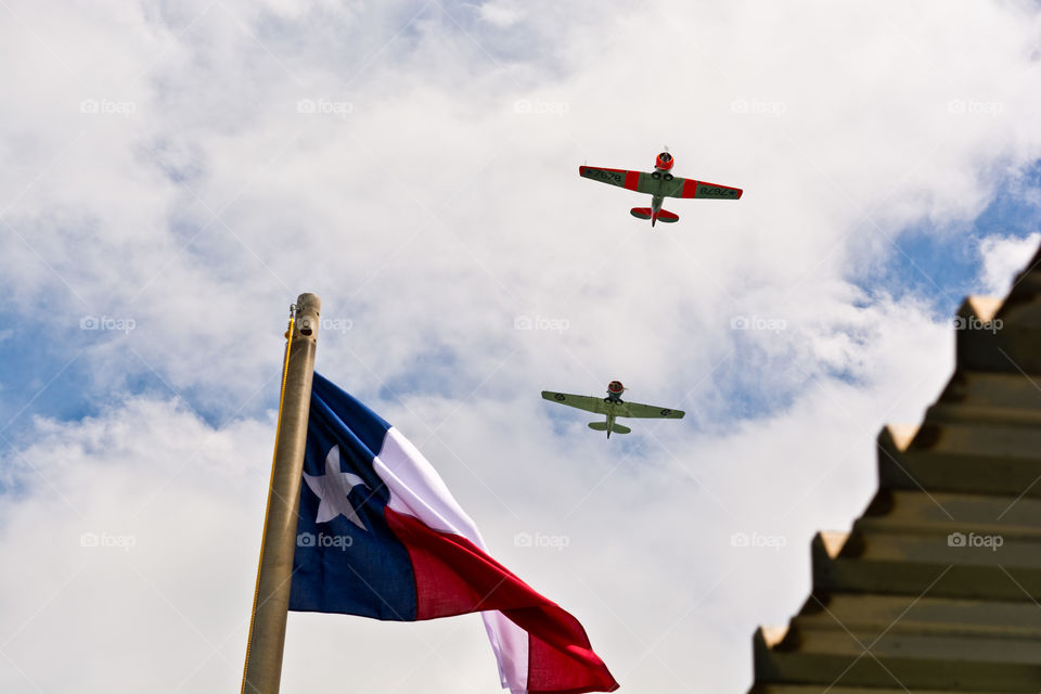 Texas Pride. Planes flying over a Texas flag. 