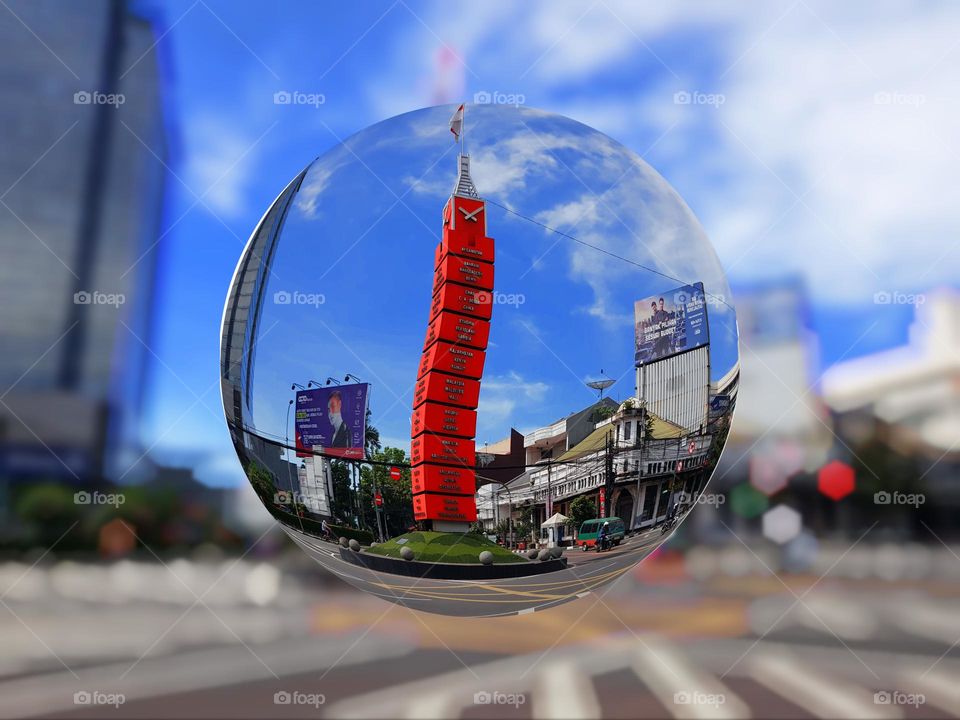 Simpang Lima Monument, Bandung city Indonesia, city red hour monument, asia africa monument, 15 meter monument, in crystal glass ball, blur, bokeh, view blur, image crystal ball, bandung city monument view, city park in a ctyatal glass ball