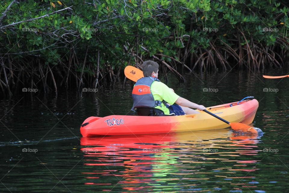 A little kayak commute to through the mangroves to the sea 