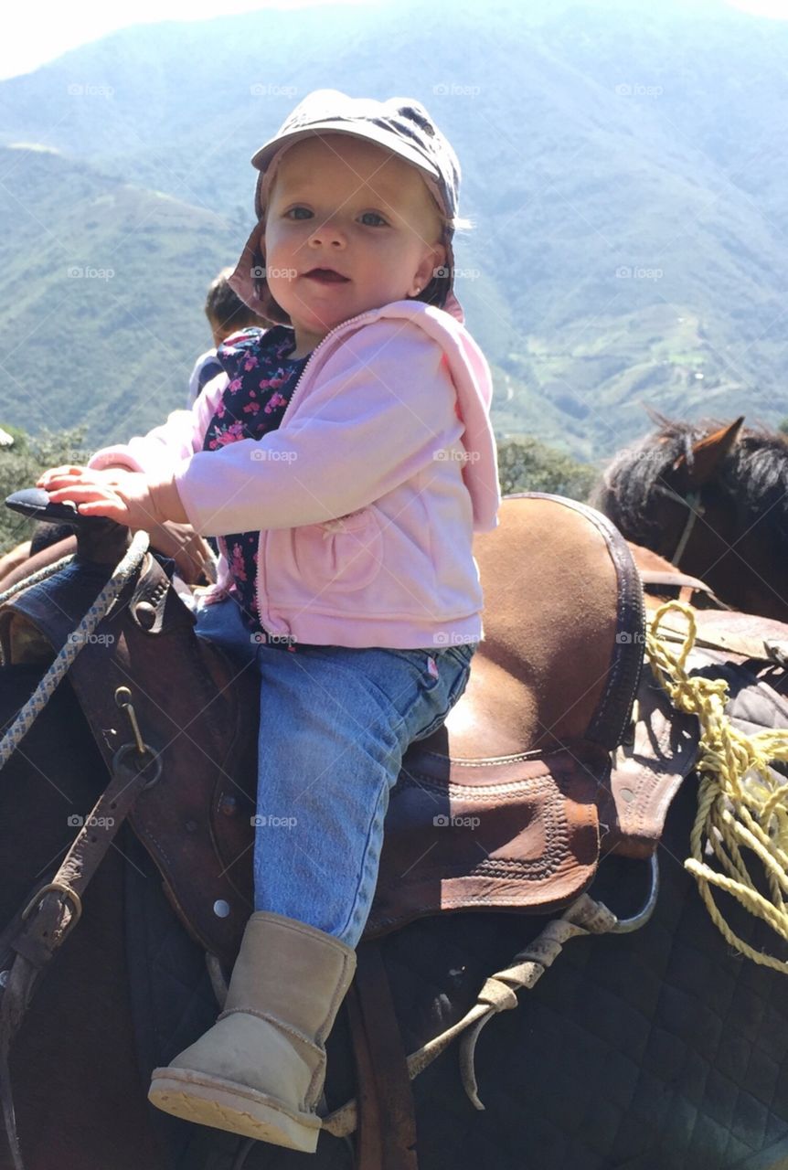 Baby horse riding 