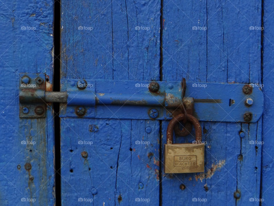 blue door metal nail by kshapley