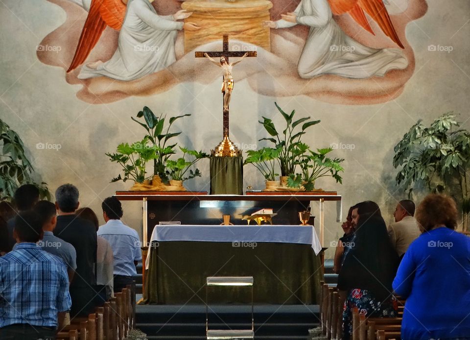 Catholic Church. Parishioners Praying In Sunday Mass
