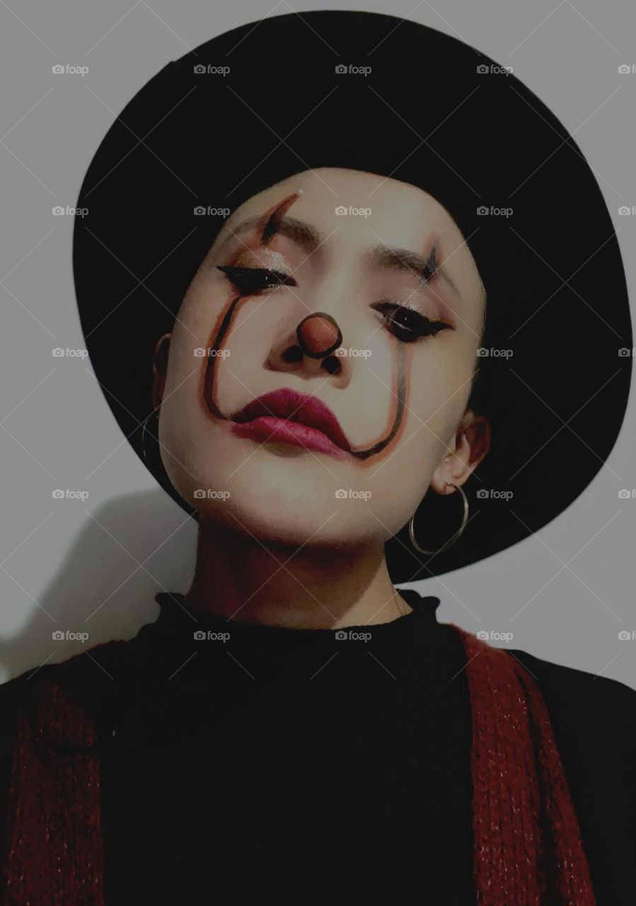 A women and her crazy funky outfit in Halloween 