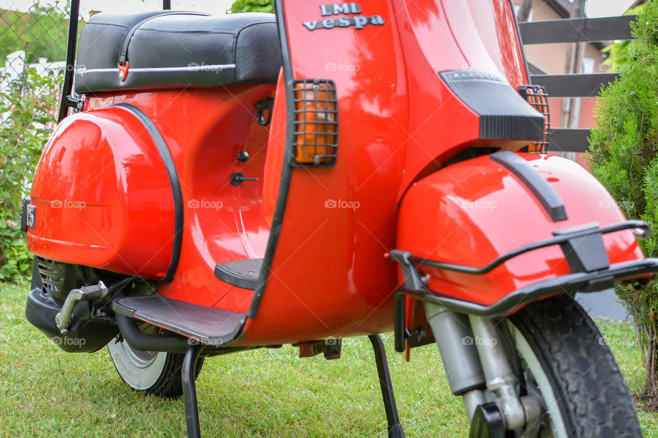 red vespa motorcycle