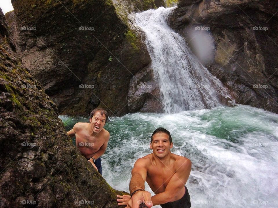 Under the waterfall