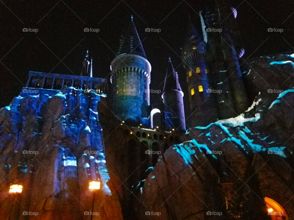 Lights ride the stone laughing and dancing