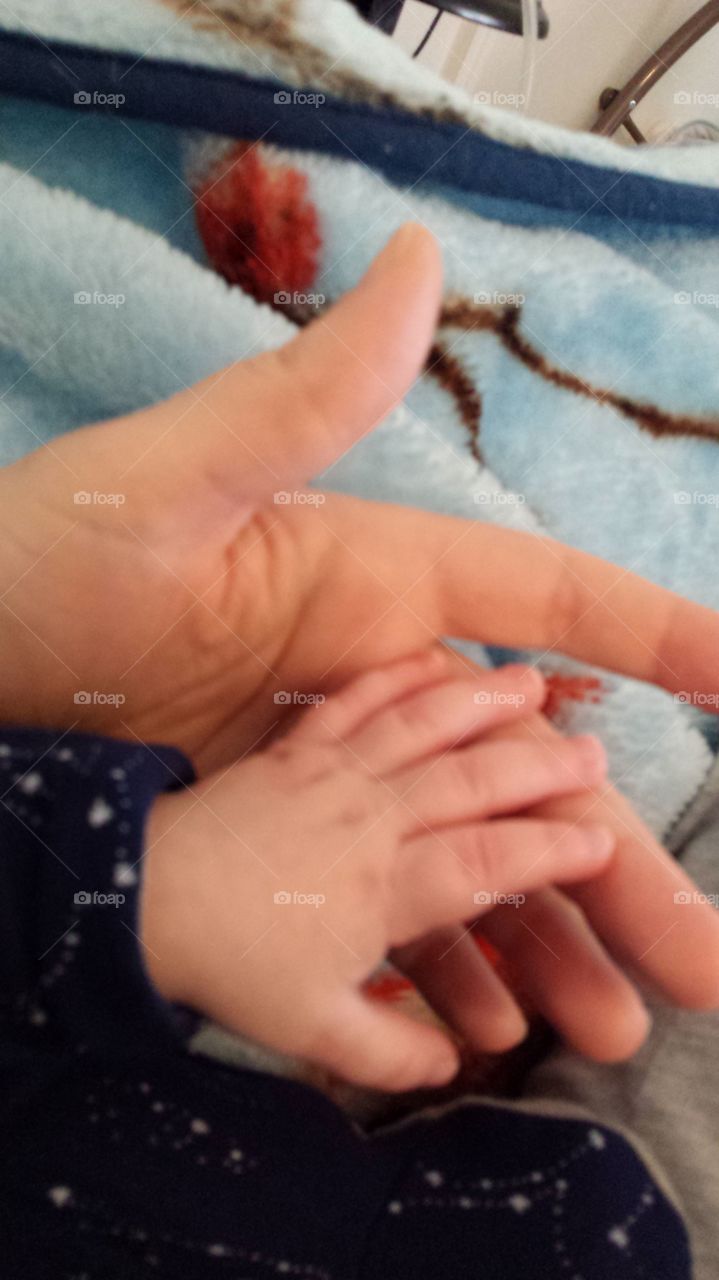 My sons hand in mine