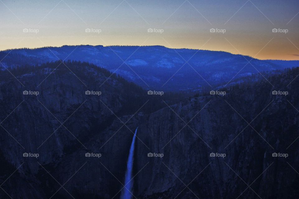 Waterfall view during sunset