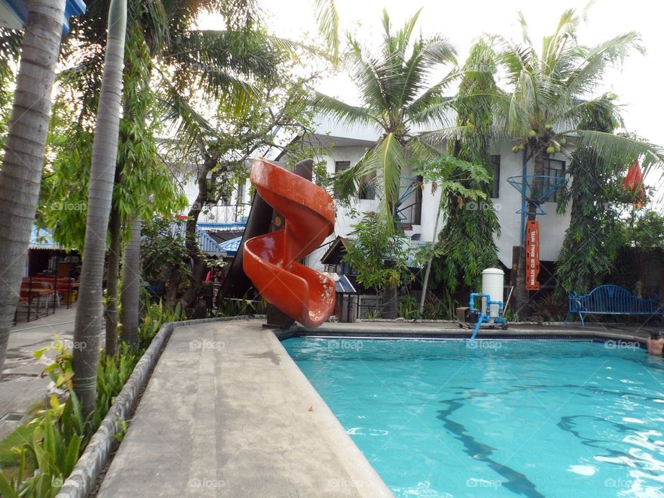 Resort pool with slide