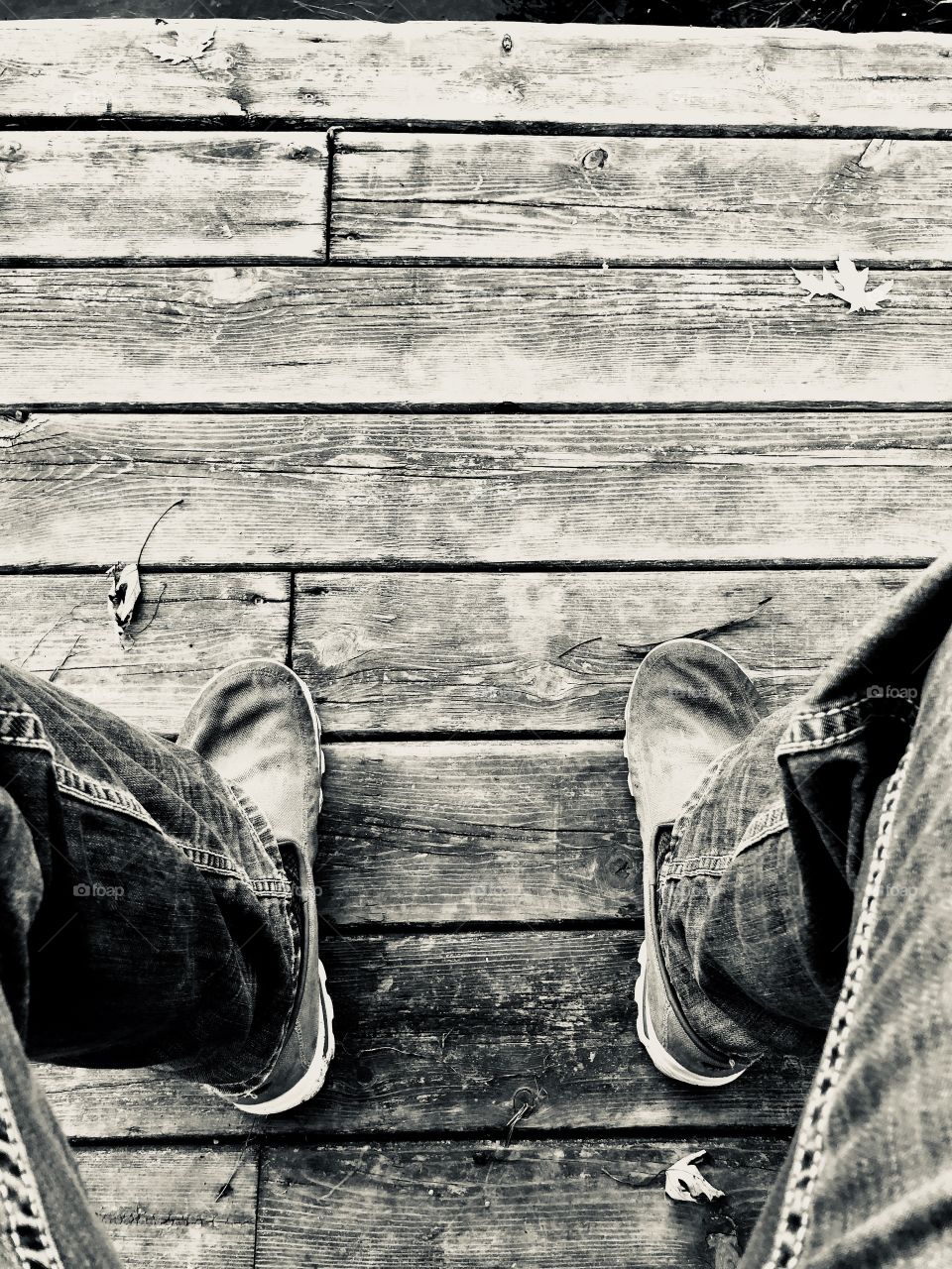 Feet on an old dock