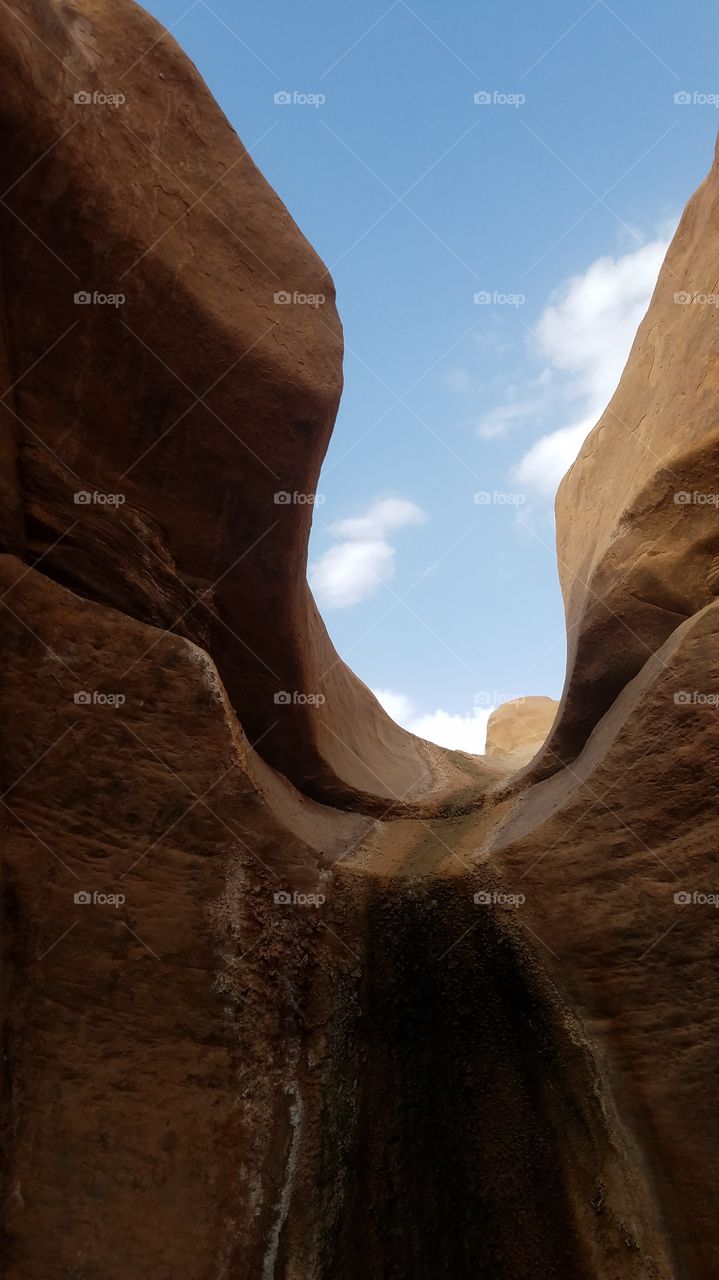 View from under a rock open to the sky