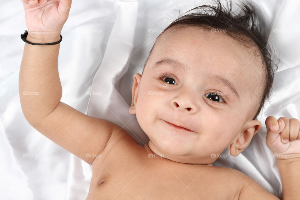 Elevated view of smiling baby