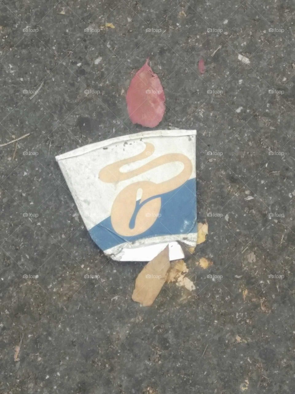 Flattened coffee cup