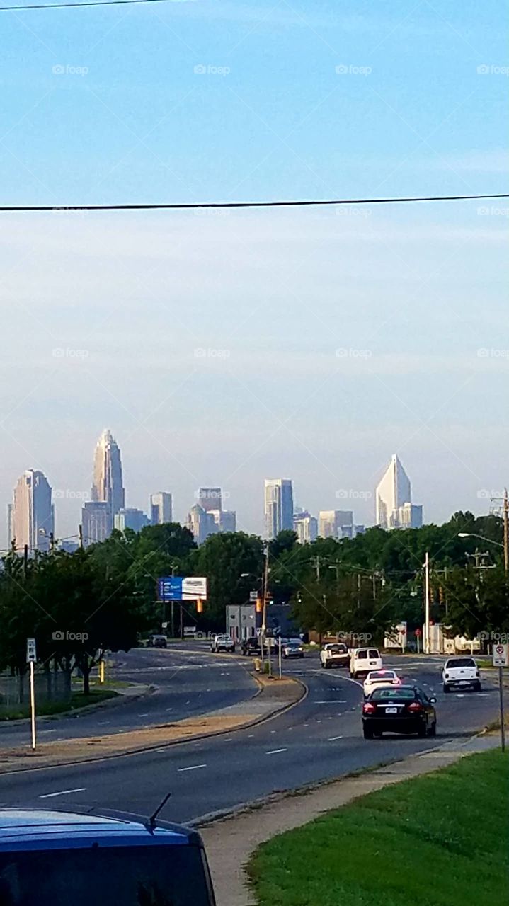 it's downtown Charlotte but it looks like the power line is dividing the sky into two distinct sections