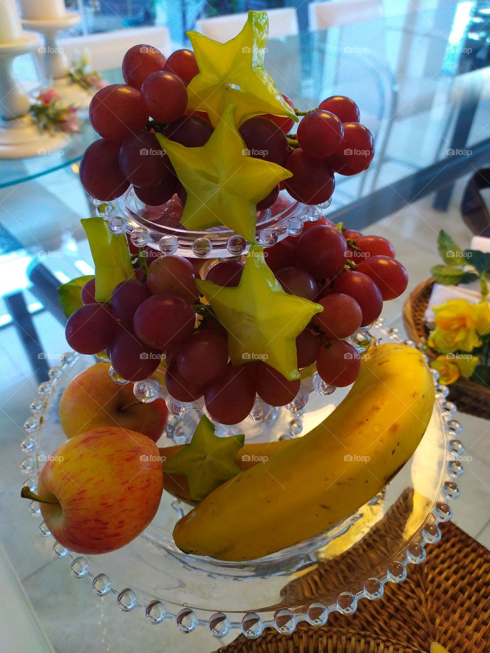Bananas apples grape and star fruit