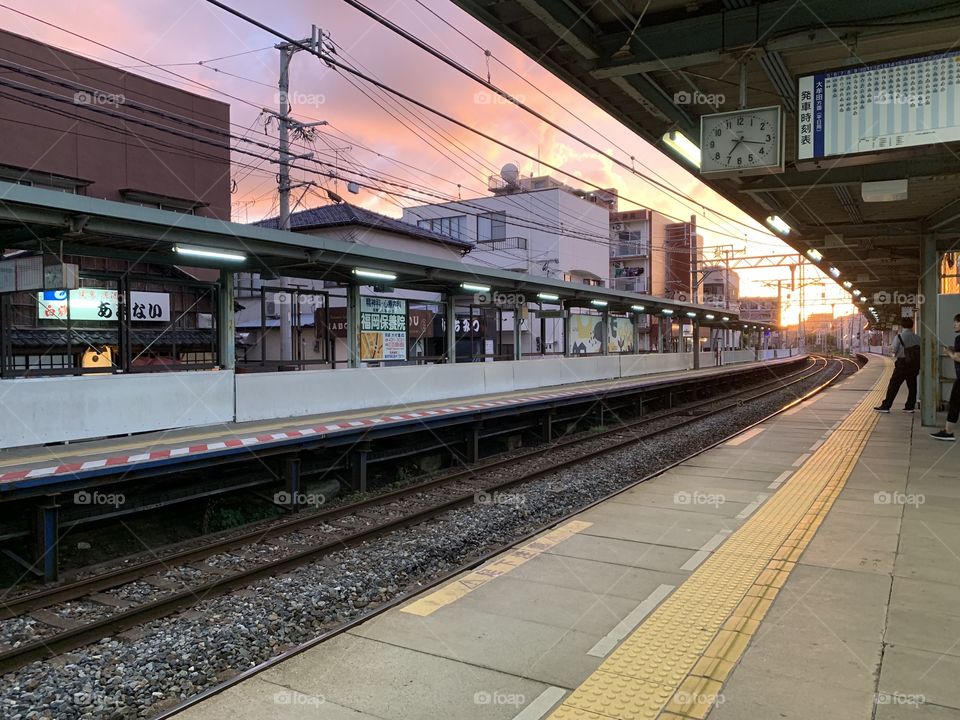 Nice picture of a sky in japan in the train station