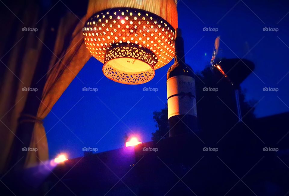 Wining and dining under the moonlight with candles to set the mood, right in my backyard