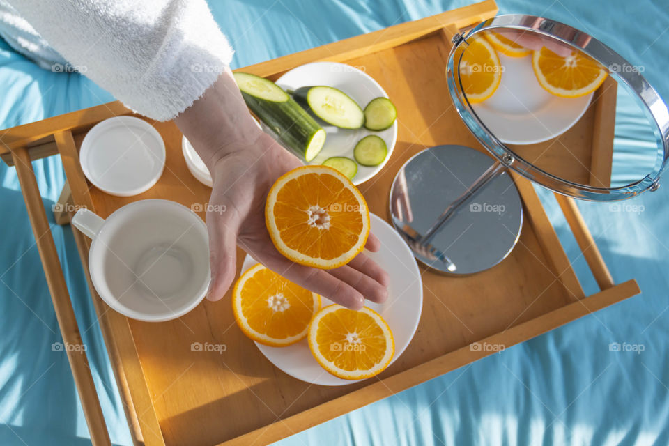 Man eating breakfast with vegetables and fruits
