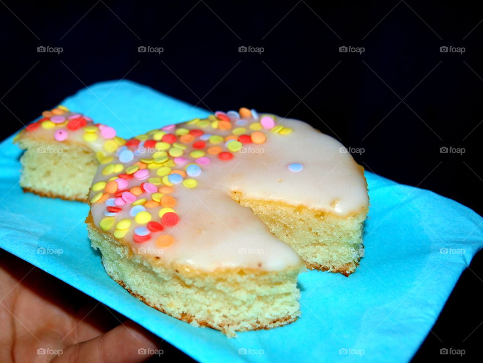 colourful Cake in a fish Form for Christmas, black background