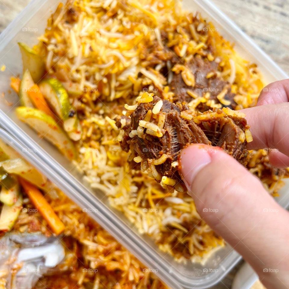 Spicy and delicious chicken mutton dum briyani