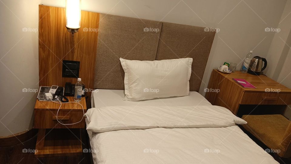 Bed, switch, charger and charging plug