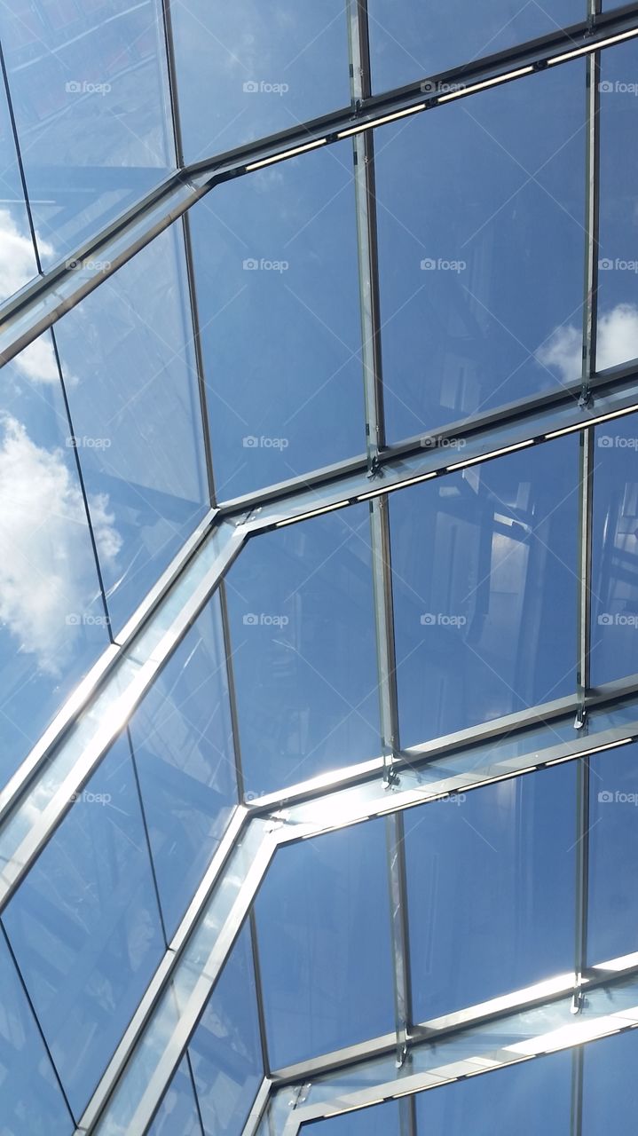 Blue skies through a window ceiling