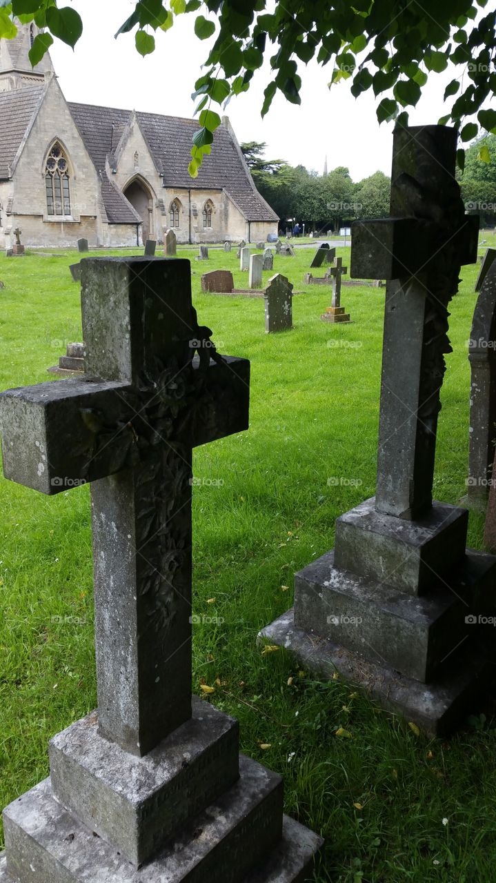 English cemetery
100 + years old graves
Some people think graveyard and cemetery mean the same, but, if we want to be a little nitpicky, we should say that graveyard is a type of cemetery, but a cemetery is usually not a graveyard. To understand the difference, we need a little bit of history.
From about the 7th century, the process of burial was firmly in the hands of the Church (meaning the organization), and burying the dead was only allowed on the lands near a church (now referring to the building), the so-called churchyard. The part of the churchyard used for burial is called graveyard, an example of which you can see in the picture.
As the population of Europe started to grow, the capacity of graveyards was no longer sufficient (the population of modern Europe is almost 40 times higher than it was in the 7th century). By the end of the 18th century, the unsustainability of church burials became apparent, and completely new places, independent of graveyards, were devised—and these were called cemeteries.
The etymology of the two words is also quite intriguing. The origin of "graveyard" is rather obvious; it is a yard filled with graves. However, you might be surprised to hear that "grave" comes from Proto-Germanic *graban, meaning "to dig", and is unrelated to "gravel".
Of course, the word "cemetery" did not appear out of the blue when graveyards started to burst at the seams. It comes from Old French cimetiere, which meant, well, graveyard. Nevertheless, the French word originally comes from Greek koimeterion, meaning "a sleeping place". Isn't that poetic?