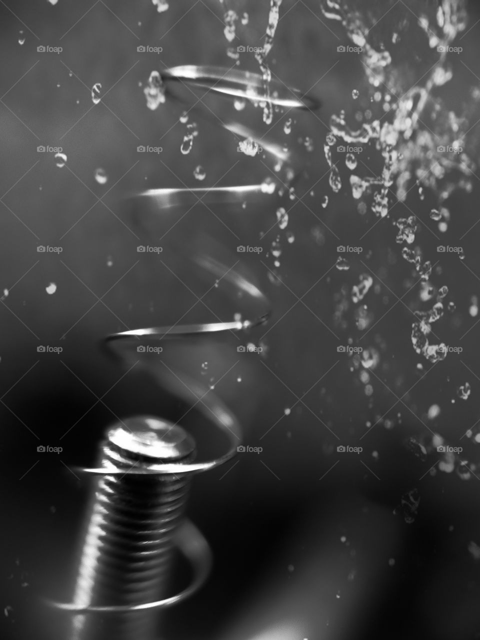 Small springs and nuts, and splashes of water