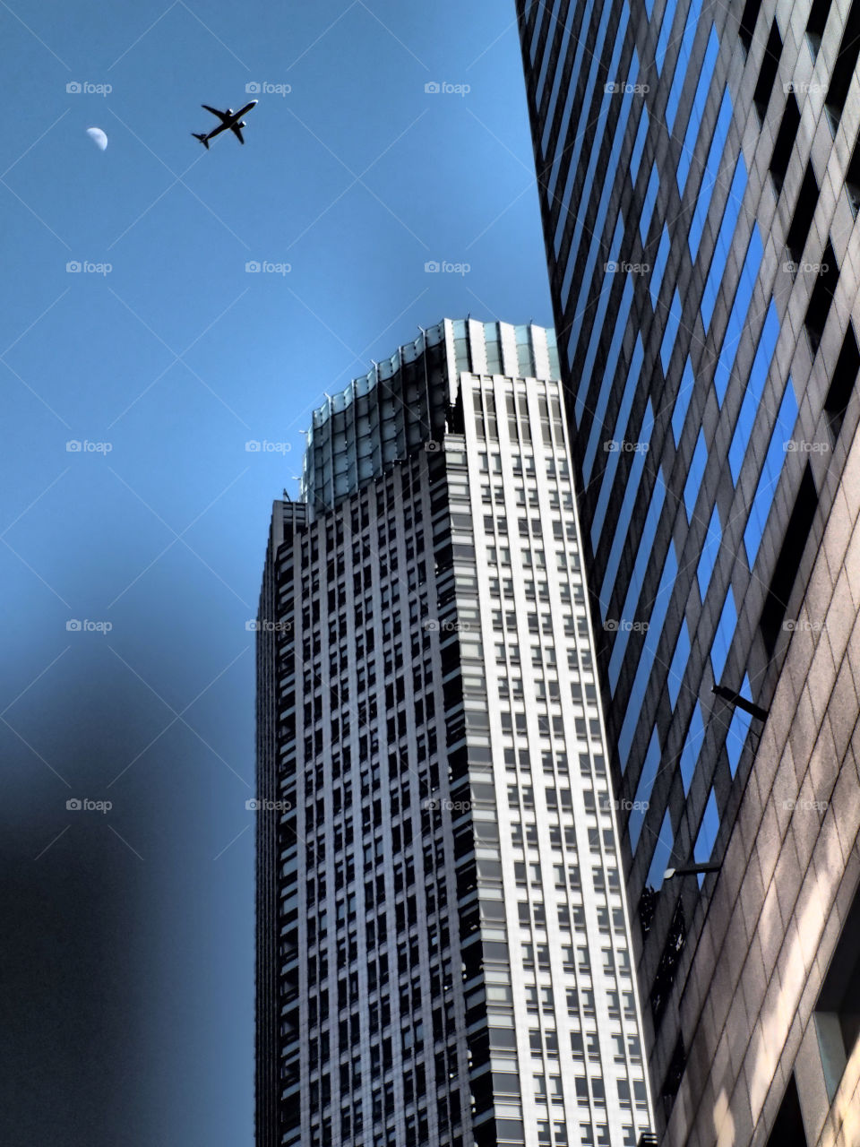 Plane across the moon