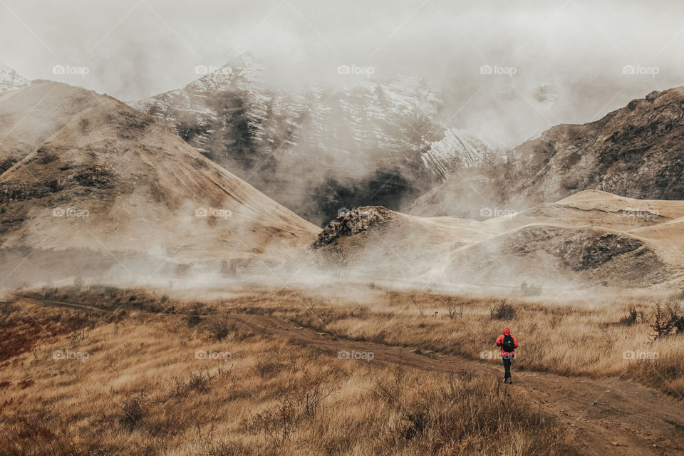 Landscape view of man walking in nature 