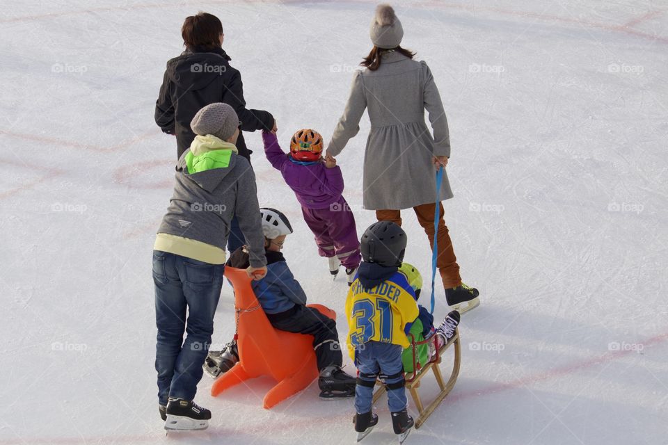 Family on ice rink